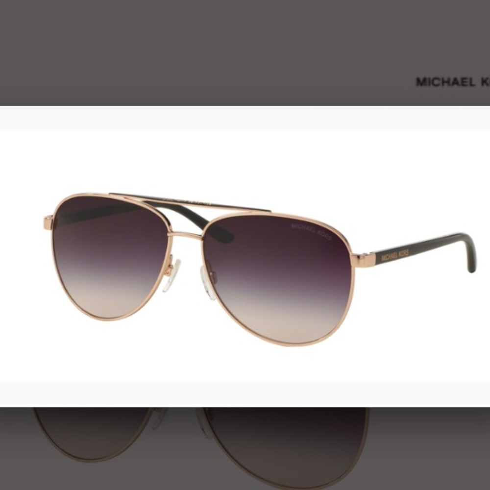 Michael kors rose gold frame sunglasses. MK5007